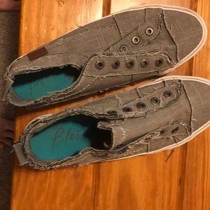 Blowfish slide in sneakers.